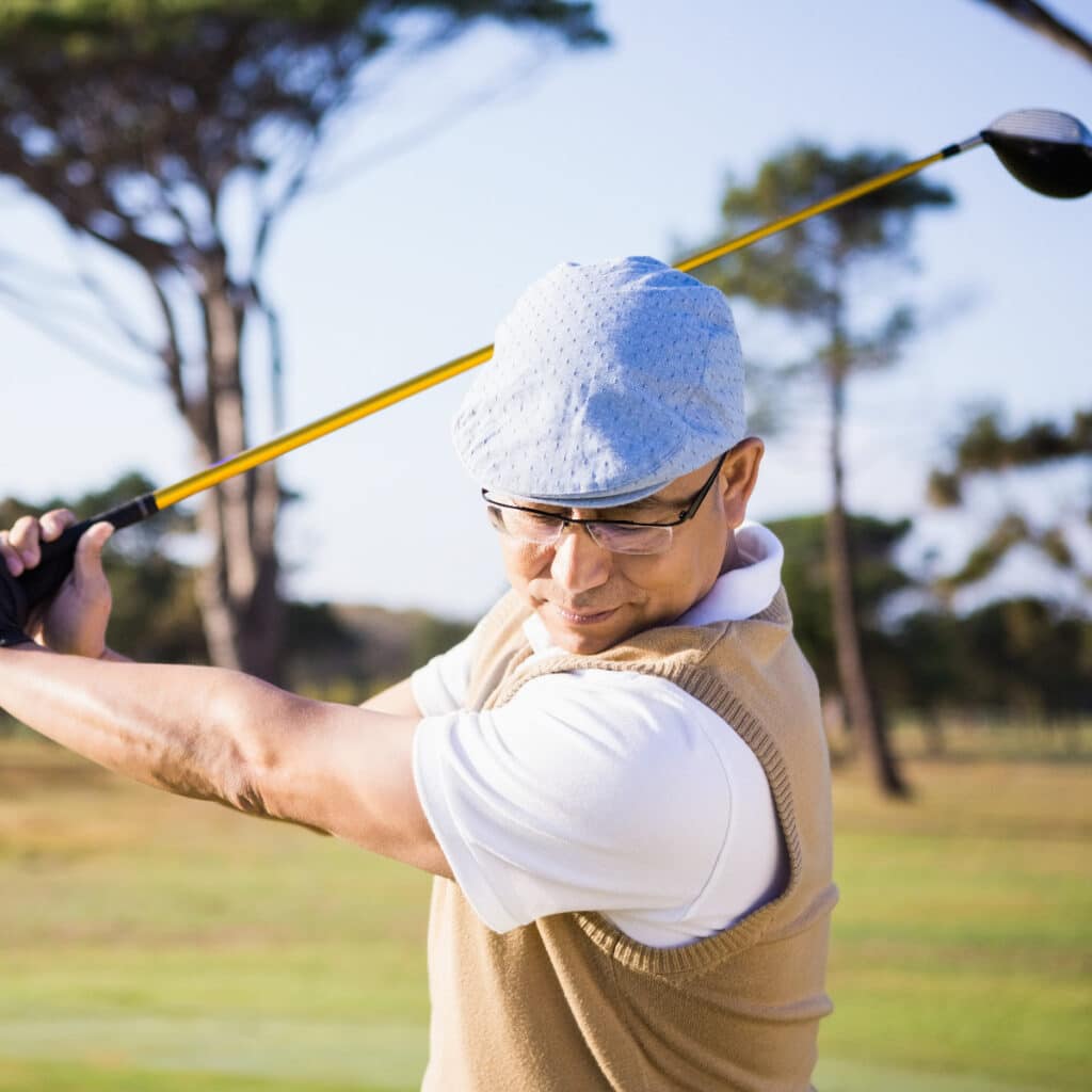Sicher-Golfen-Paket half length of sportsman playing golf TXZKZ8 2L 1 Golfreisen